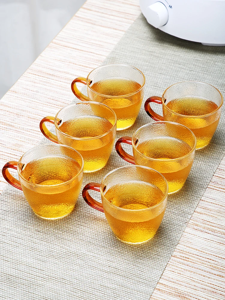 Tang Feng Heat Resistant Glass Cup Set of 6 Small Tea Cups with Hammer Pattern Modern Chinese Sle Home Use Transparent Cups
Tang Feng Heat Resistant Glass Cup Set of 6 Small Tea Cups with Hammer Pattern Modern Chinese Sle Home Use Transparent Cups