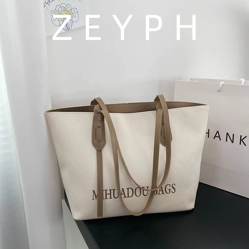 Zeyph Large Capacity Canvas Bag Women's Casual Shoulder Bag New Stylish Trendy Design Handbag for Everyday Use
Zeyph Large Capacity Canvas Bag Women's Casual Shoulder Bag New Stylish Trendy Design Handbag for Everyday Use