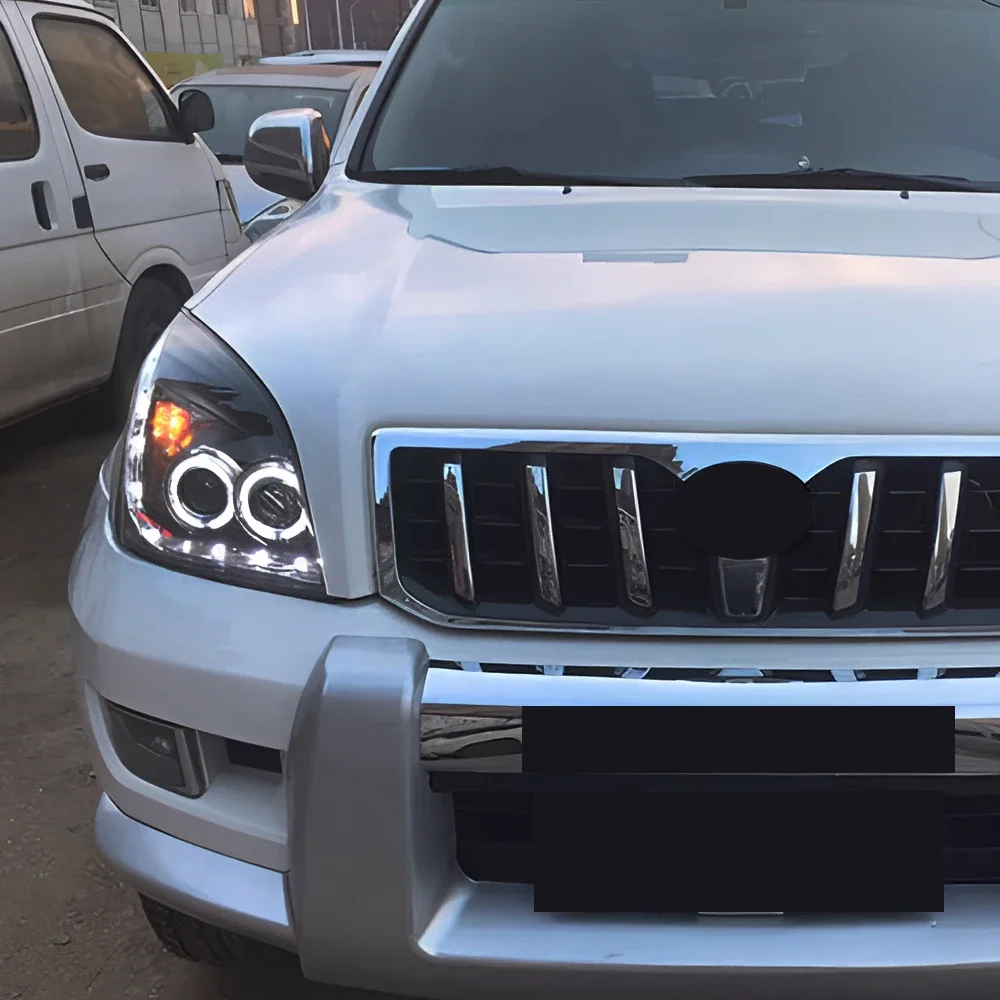 Модифицированные автомобильные передние фонари в сборе для Toyota Prado 2004-2009, обновленная двухлучевая линза, мигающий сигнал, светодиодные аксессуары для автомобильных фар
Модифицированные автомобильные передние фонари в сборе для Toyota Prado 2004-2009, обновленная двухлучевая линза, мигающий сигнал, светодиодные аксессуары для автомобильных фар