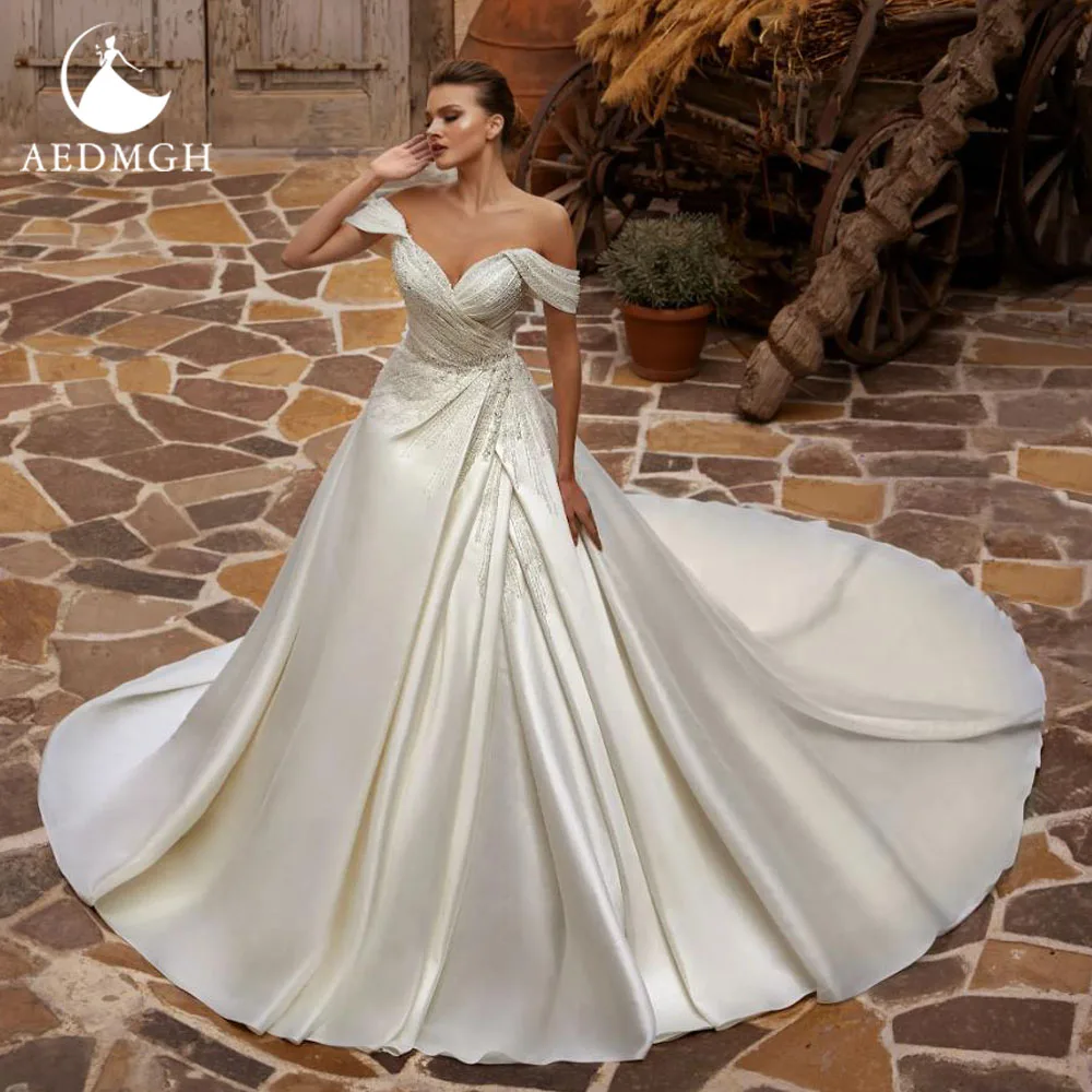 Aedmgh A-Line Delicate Wedding Dresses Sweetheart Off The Shoulder Vestido De Novia Beaded Matte Satin Custom Made Bridal Gowns
Aedmgh A-Line Delicate Wedding Dresses Sweetheart Off The Shoulder Vestido De Novia Beaded Matte Satin Custom Made Bridal Gowns
