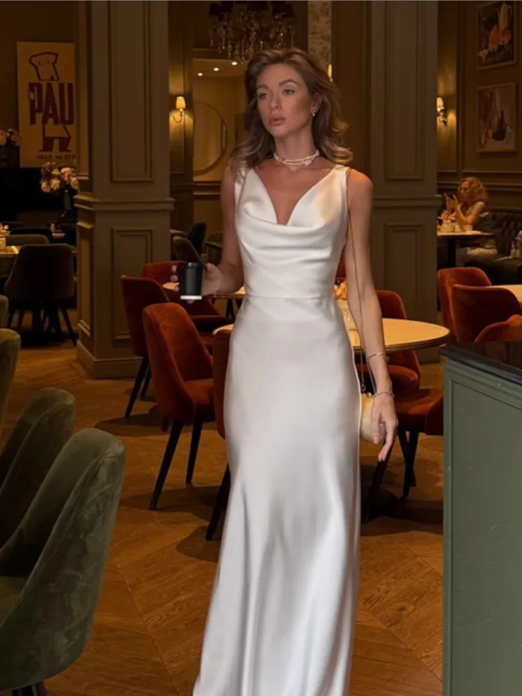 Dresses For Woman Solid Color Vestidos Sexy Backless Long Evening Dress Elegant V-neck Robe Spaghetti Strap Vacation Temperament
Dresses For Woman Solid Color Vestidos Sexy Backless Long Evening Dress Elegant V-neck Robe Spaghetti Strap Vacation Temperament