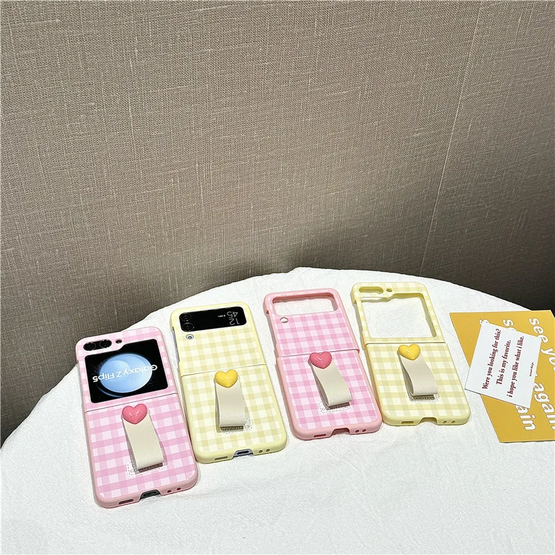 Fresh Grid Love Ring Buckle Phone Case for Samsung Galaxy ZFlip3 ZFlip4 ZFlip5 ZFlip6 Hard PC Back Cover for ZFlip6 Case Shell
Fresh Grid Love Ring Buckle Phone Case for Samsung Galaxy ZFlip3 ZFlip4 ZFlip5 ZFlip6 Hard PC Back Cover for ZFlip6 Case Shell