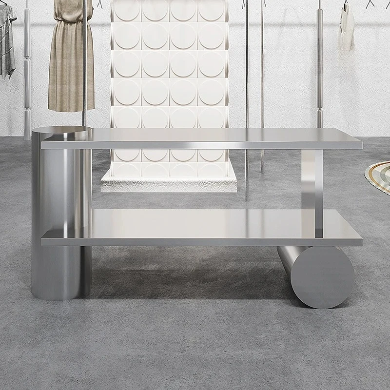 Clothing store table with stainless steel flowers, shoes, bags, high and low display stand in the middle
Clothing store table with stainless steel flowers, shoes, bags, high and low display stand in the middle