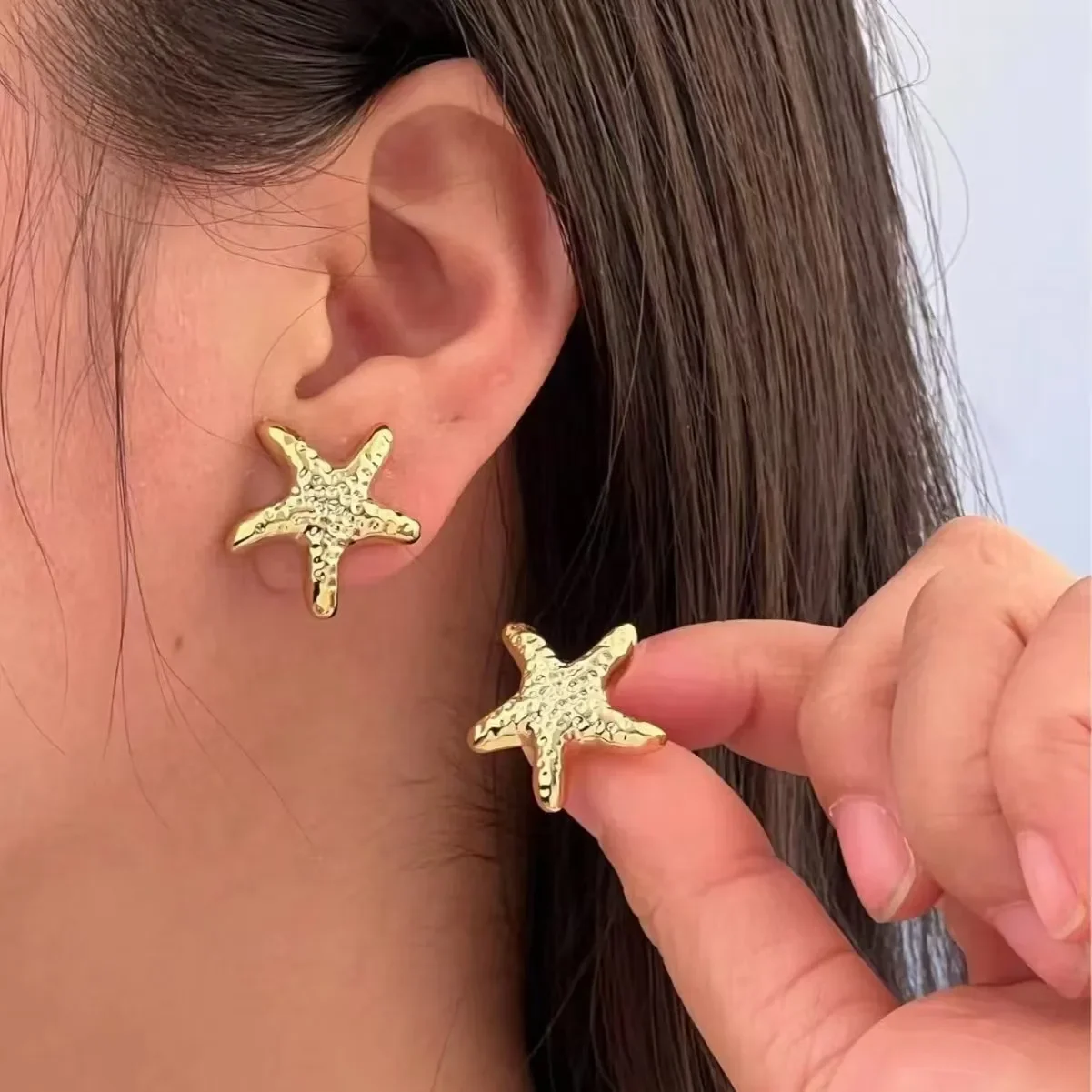 Fashion gold starfish earrings 2026 new earrings simple star temperament creative design ear jewelry
Fashion gold starfish earrings 2026 new earrings simple star temperament creative design ear jewelry