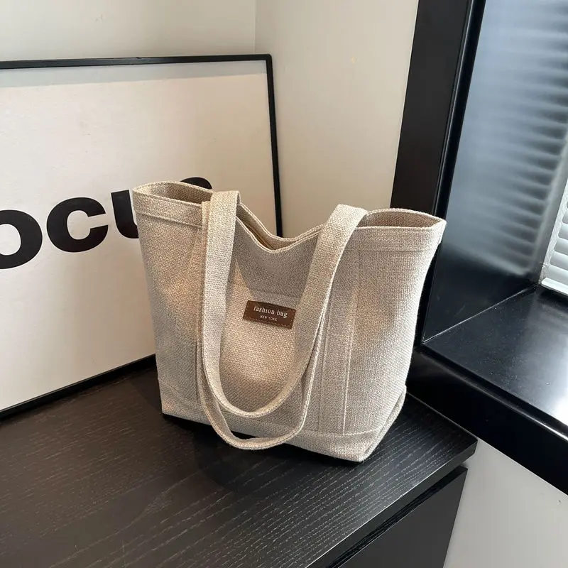 Fashionable Canvas Bag Handheld Linen Big Bag New Large Capacity Solid Color Tote Korean Version Travel Bag Women Underarm Bags
Fashionable Canvas Bag Handheld Linen Big Bag New Large Capacity Solid Color Tote Korean Version Travel Bag Women Underarm Bags