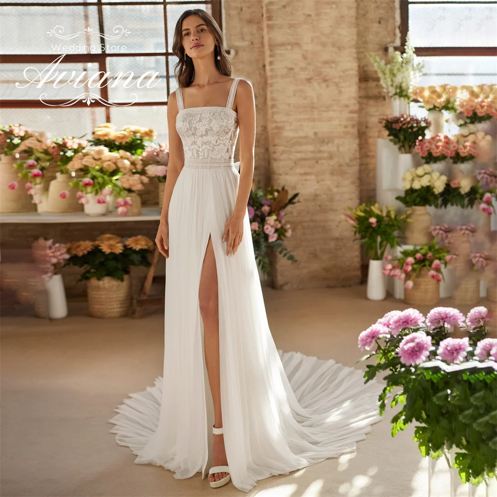 Aviana свадебное платье трапециевидной формы без рукавов с кружевной вышивкой и высоким разрезом со шлейфом на шнуровке сзади и бантом без рукавов с квадратным вырезом
Aviana свадебное платье трапециевидной формы без рукавов с кружевной вышивкой и высоким разрезом со шлейфом на шнуровке сзади и бантом без рукавов с квадратным вырезом