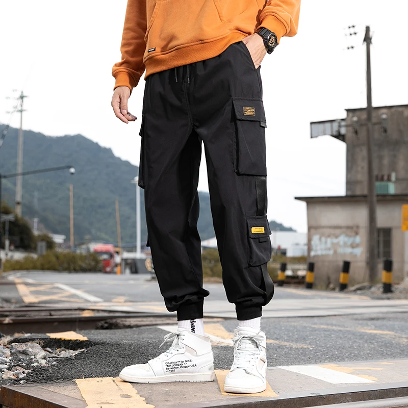 Модные повседневные свободные брюки для мужчин на весну и осень, молодежные длинные брюки Dync Sle, длинные брюки свободного кроя из полиэстера
Модные повседневные свободные брюки для мужчин на весну и осень, молодежные длинные брюки Dync Sle, длинные брюки свободного кроя из полиэстера