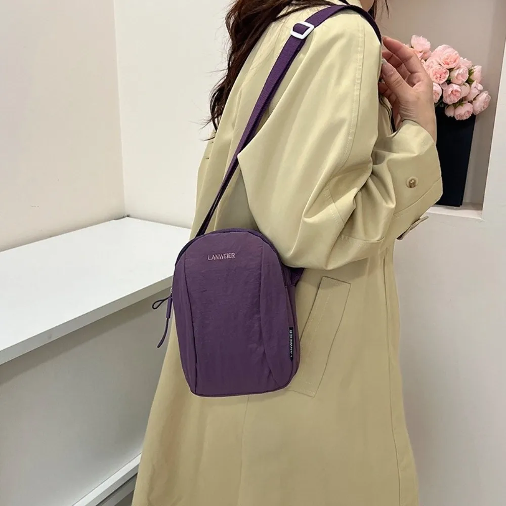Casual Small Size Crossbody Bag Multi-Pocket Nylon Travel Phone Bag Lightweight Large Capacity Shoulder Bag
Casual Small Size Crossbody Bag Multi-Pocket Nylon Travel Phone Bag Lightweight Large Capacity Shoulder Bag