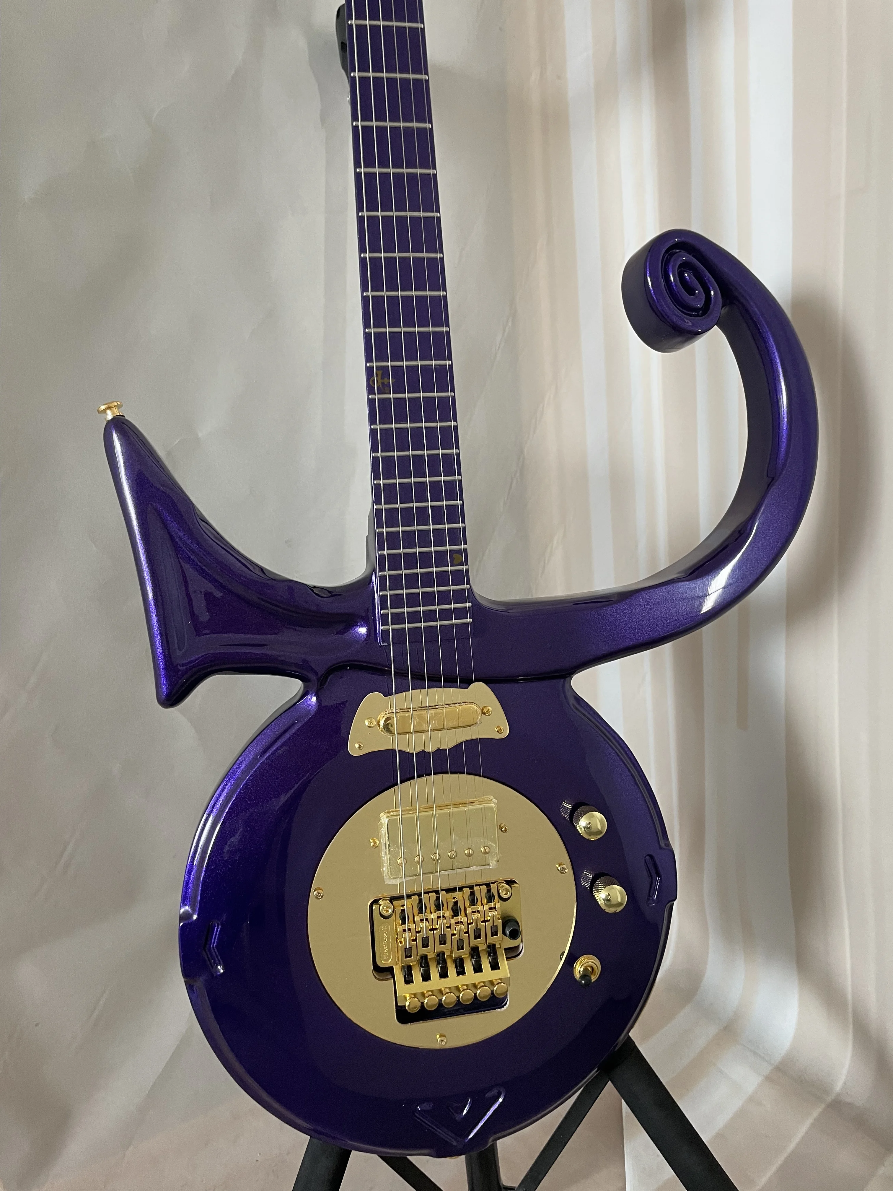 Light Purple Prince Electric Guitar Solid Body No Inaly Fretboard Gold Hardware
Light Purple Prince Electric Guitar Solid Body No Inaly Fretboard Gold Hardware