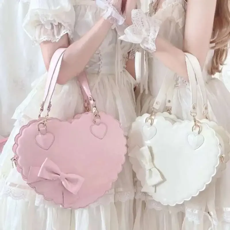 PU Heart Lolita Handbags Girls Bowknots Decor Japanese Shoulder Bags Two Sized Kawaii Shell Purses Cute Pink Messenger Bag Gifts
PU Heart Lolita Handbags Girls Bowknots Decor Japanese Shoulder Bags Two Sized Kawaii Shell Purses Cute Pink Messenger Bag Gifts