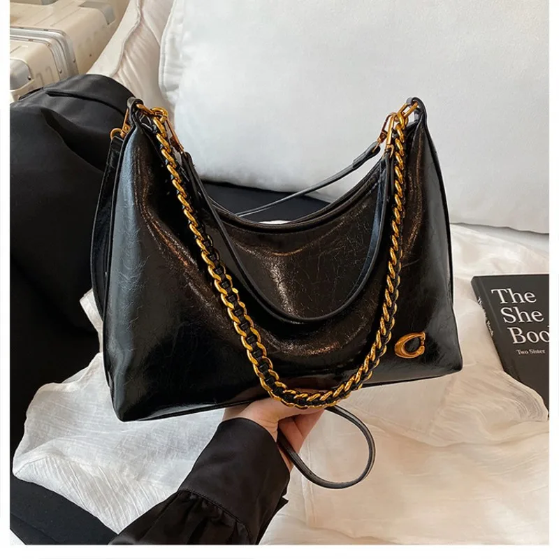 New vintage waxed leather ladies' chain handbag - large capacity, single shoulder bag, fashionable and versatile crossbody bag
New vintage waxed leather ladies' chain handbag - large capacity, single shoulder bag, fashionable and versatile crossbody bag