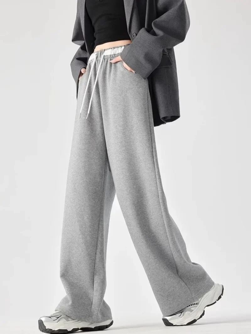 Брюки женские с эластичной резинкой на талии, корейская мода, популярные осенние мешковатые уличные повседневные спортивные штаны для молодых студентов, классические
Брюки женские с эластичной резинкой на талии, корейская мода, популярные осенние мешковатые уличные повседневные спортивные штаны для молодых студентов, классические