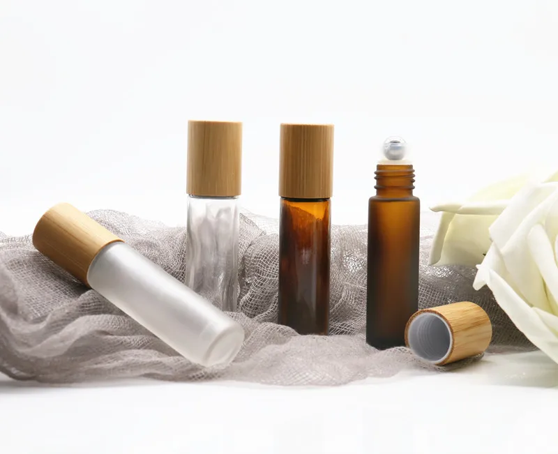 Роликовая бутылка с эфирным маслом на заказ, бамбуковая крышка, упаковка косметической жидкости, 5 мл, 10 мл, многоразовый янтарный стеклянный рулон на флаконе для духов
Роликовая бутылка с эфирным маслом на заказ, бамбуковая крышка, упаковка косметической жидкости, 5 мл, 10 мл, многоразовый янтарный стеклянный рулон на флаконе для духов