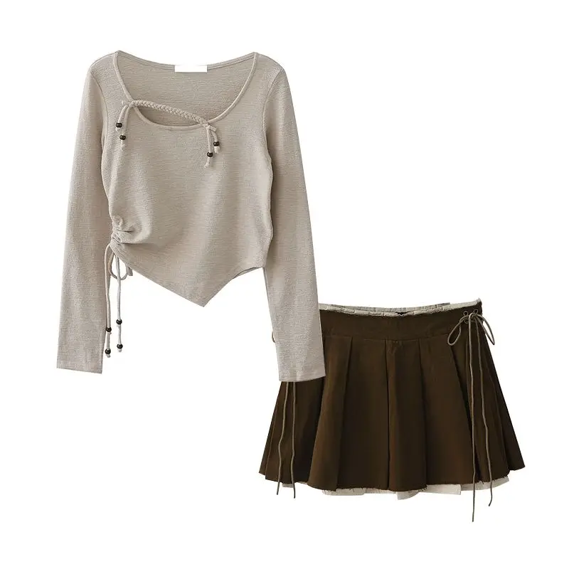 Autumn New Long Sleeve Shirt American Sweet Spicy Wasteland Drawstring Short T-shirt Top Strap Woven Skirt Elegant Casual Set
Autumn New Long Sleeve Shirt American Sweet Spicy Wasteland Drawstring Short T-shirt Top Strap Woven Skirt Elegant Casual Set