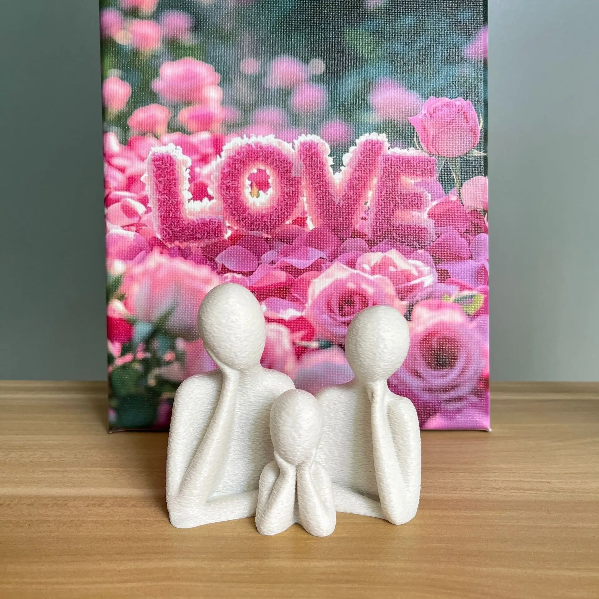 A family decorated wedding statue for three people perfect as an anniversary gift for husband and wife newlyweds or as an art
A family decorated wedding statue for three people perfect as an anniversary gift for husband and wife newlyweds or as an art