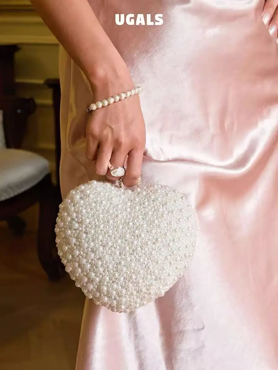 Fashion Pearl Beads Heart Shape Bag Luxury Women Handbag Exquisite Evening Bag Wedding Party Clutch Purse Shoulder Crossbody Bag
Fashion Pearl Beads Heart Shape Bag Luxury Women Handbag Exquisite Evening Bag Wedding Party Clutch Purse Shoulder Crossbody Bag