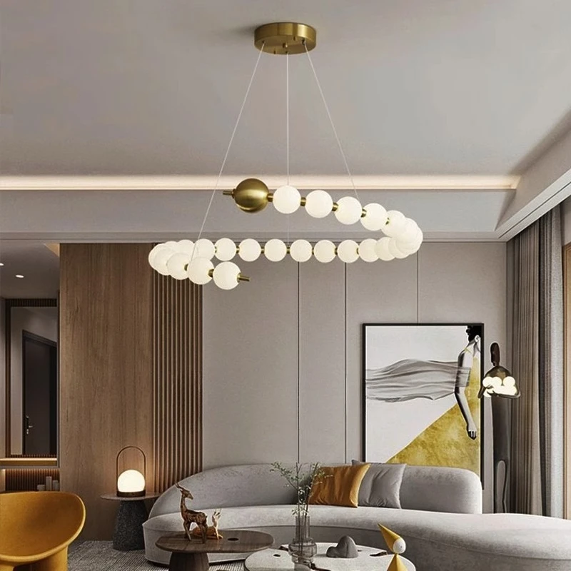 Light luxury creative designer pendant lamp, living room, dining room, bar counter, hotel pearl string lighting fixture
Light luxury creative designer pendant lamp, living room, dining room, bar counter, hotel pearl string lighting fixture