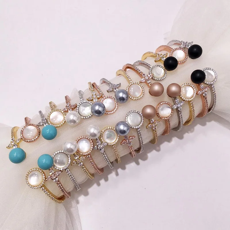simple fashion Retro Lucky Four Leaf Flower Cross Star Small Fragrant Flower High quality Micro inlaid Zircon Shell Pearl Open
simple fashion Retro Lucky Four Leaf Flower Cross Star Small Fragrant Flower High quality Micro inlaid Zircon Shell Pearl Open