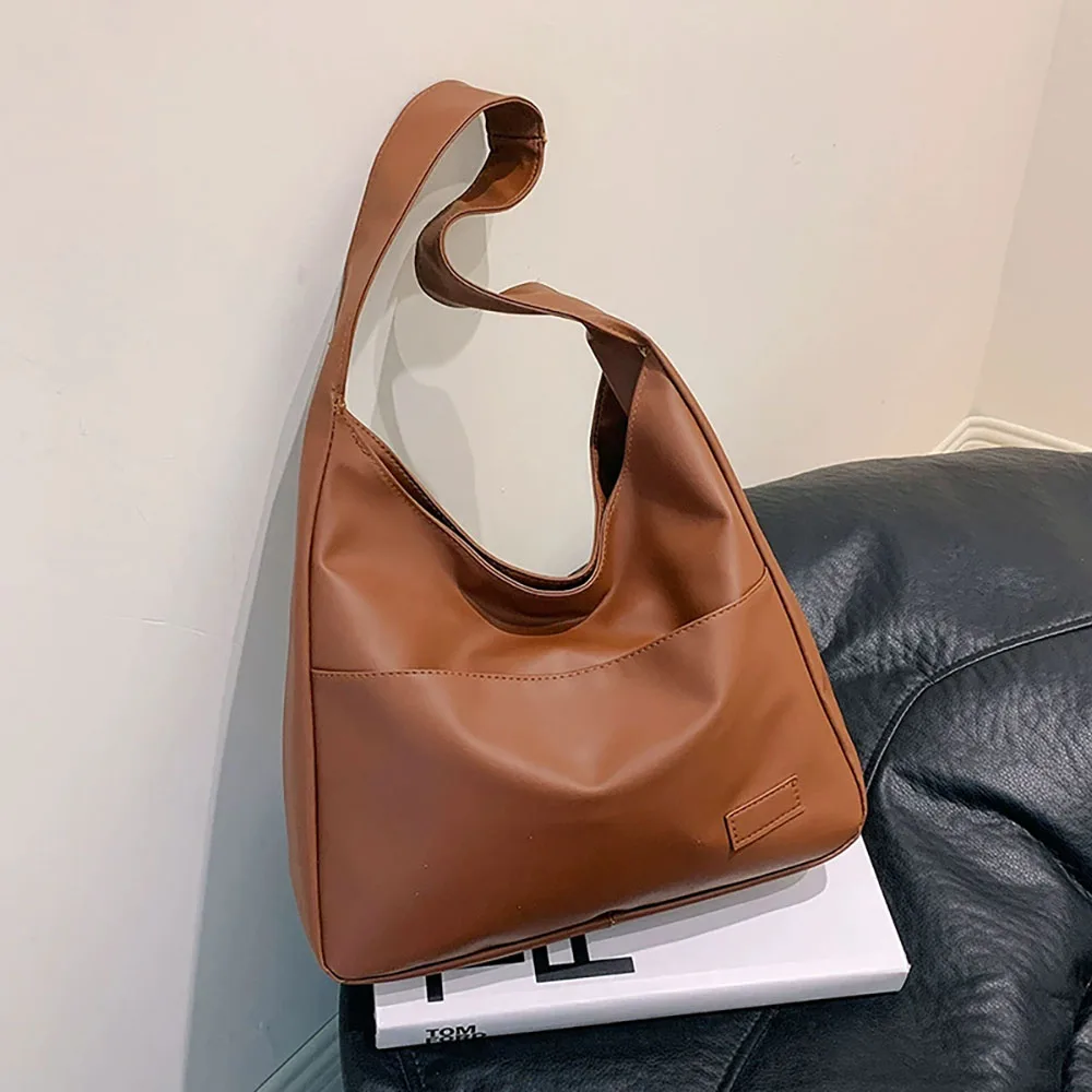 Large capacity tote bag, new black leather simple casual commuting women's bag, fashionable and versatile single shoulder bag
Large capacity tote bag, new black leather simple casual commuting women's bag, fashionable and versatile single shoulder bag