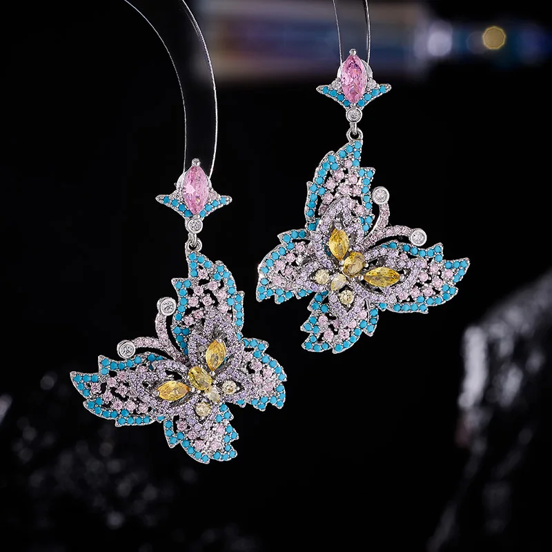 European and American Light Luxury Micro Inlaid Zircon Butterfly Earrings for Women Colorful Heavy Craft Silver Needle Fashion L
European and American Light Luxury Micro Inlaid Zircon Butterfly Earrings for Women Colorful Heavy Craft Silver Needle Fashion L