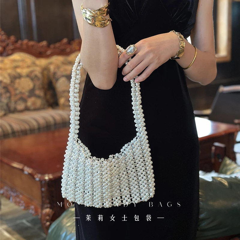 Vacation Style Pearls Shoulder Bags for Women Vintage Rhinestone Beaded Square Handbags Solid Color Casual Commute Armpit Bag
Vacation Style Pearls Shoulder Bags for Women Vintage Rhinestone Beaded Square Handbags Solid Color Casual Commute Armpit Bag