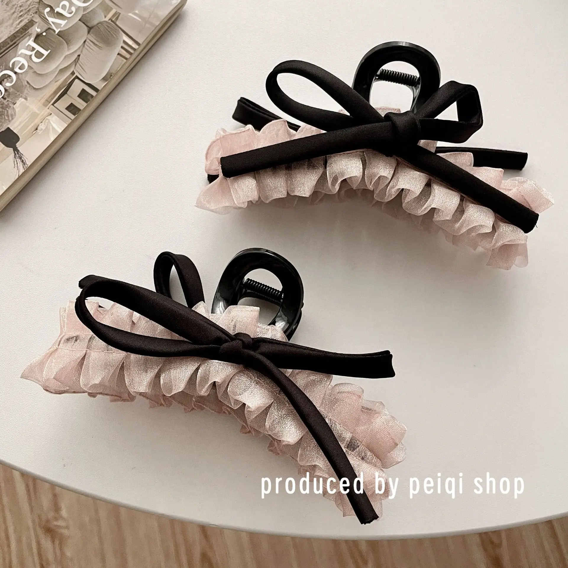 Korean version of elegant and high-end mesh, lace, bow tie, hair clip, shark clip, hair accessory at the back of the head
Korean version of elegant and high-end mesh, lace, bow tie, hair clip, shark clip, hair accessory at the back of the head