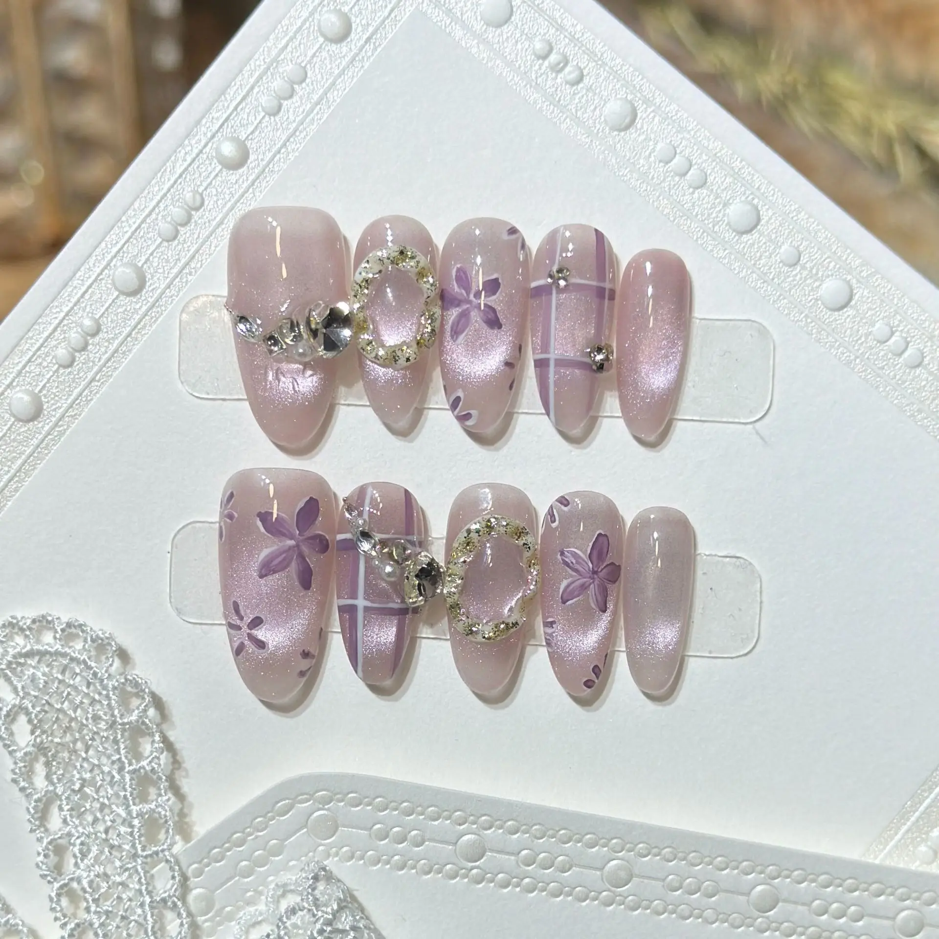 10Pcs Mid-length Almond Handmade Fake Nails Purple Cat's Eye Manicure Tips Flower Grid Rhinestone Reusable Press on False Nails
10Pcs Mid-length Almond Handmade Fake Nails Purple Cat's Eye Manicure Tips Flower Grid Rhinestone Reusable Press on False Nails