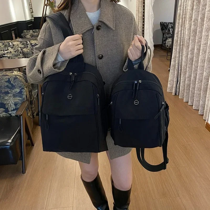 Lightweight Waterproof Nylon Backpack Casual Versatile Student Travel Bag Commuter Shoulder Bag For Ladies
Lightweight Waterproof Nylon Backpack Casual Versatile Student Travel Bag Commuter Shoulder Bag For Ladies