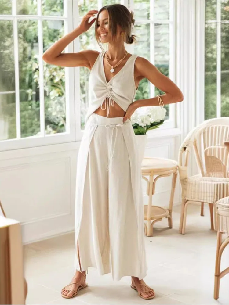 Summer Casual Shirt Sets New Women's Fashion Solid Color Drawstring Short-sleeved Tops Wide-leg Slit Trousers Two-piece Set Suit
Summer Casual Shirt Sets New Women's Fashion Solid Color Drawstring Short-sleeved Tops Wide-leg Slit Trousers Two-piece Set Suit