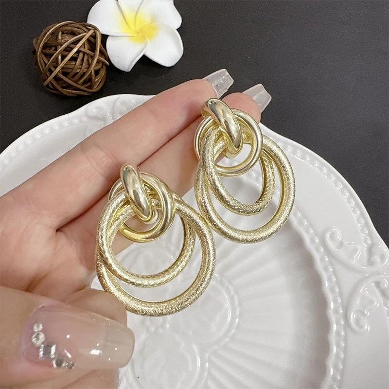 Modern Layered Ring Earrings – Copper Jewelry & Accessories for Women & Men, Textured Interwoven Circle Design, Contemporary Dan
Modern Layered Ring Earrings – Copper Jewelry & Accessories for Women & Men, Textured Interwoven Circle Design, Contemporary Dan