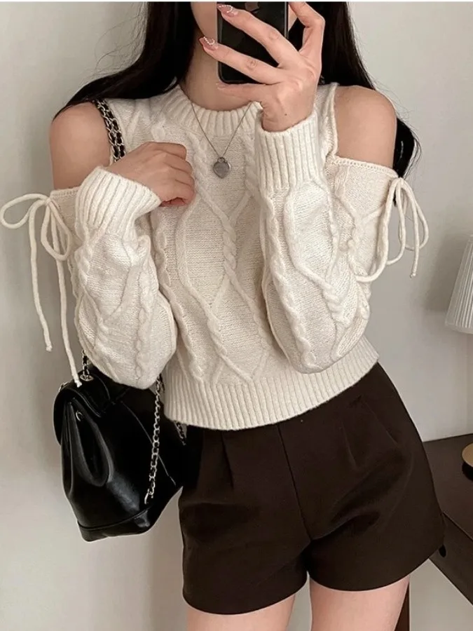 Retro Sle Knitted Sweater Women's Long Sve round Ne Twist Design Hollow out oulder Strap Sweater Chic Autumn Faion
Retro Sle Knitted Sweater Women's Long Sve round Ne Twist Design Hollow out oulder Strap Sweater Chic Autumn Faion