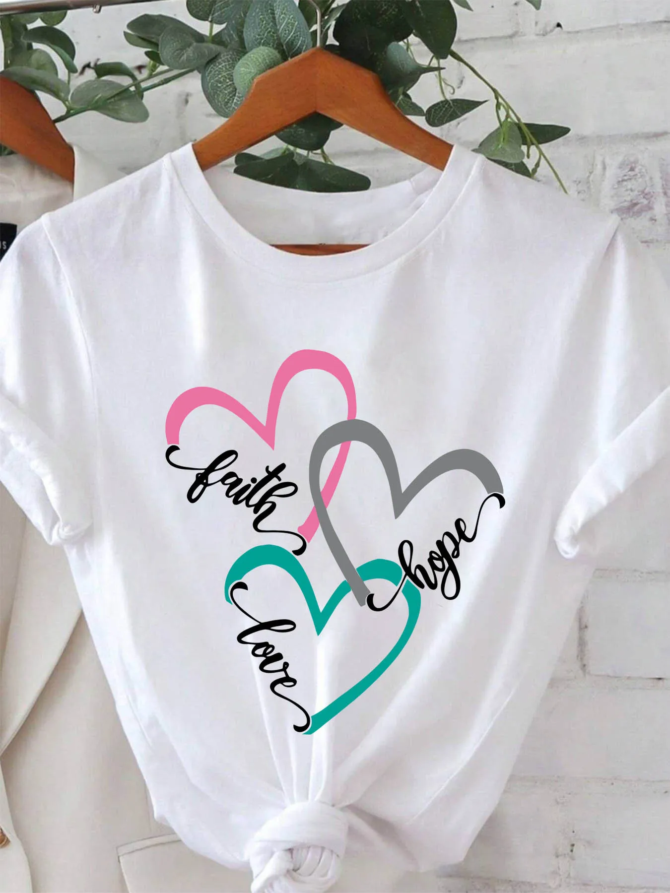 Women's Faith Love Hope heart-shaped printed short sleeved round neck casual top for spring and summer casual and playful
Women's Faith Love Hope heart-shaped printed short sleeved round neck casual top for spring and summer casual and playful