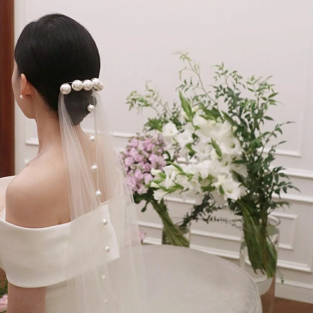 Pearl bride single-layer short trailing veil long and short plain wedding headgear
Pearl bride single-layer short trailing veil long and short plain wedding headgear