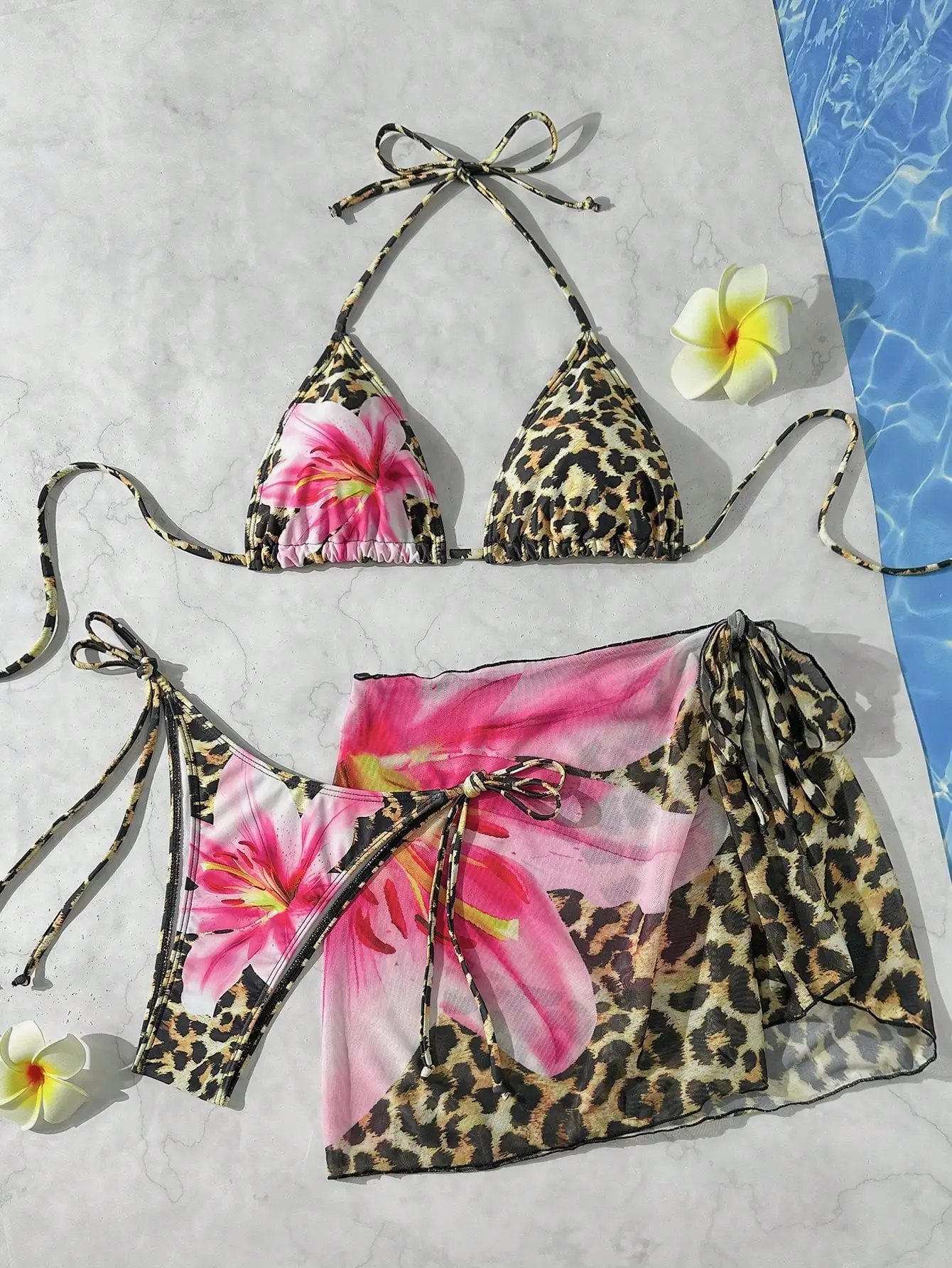 Женский комплект бикини с леопардовым и цветочным принтом, 3 предмета, с парео, регулируемыми бретелями и завязками, для пляжных вечеринок
Женский комплект бикини с леопардовым и цветочным принтом, 3 предмета, с парео, регулируемыми бретелями и завязками, для пляжных вечеринок