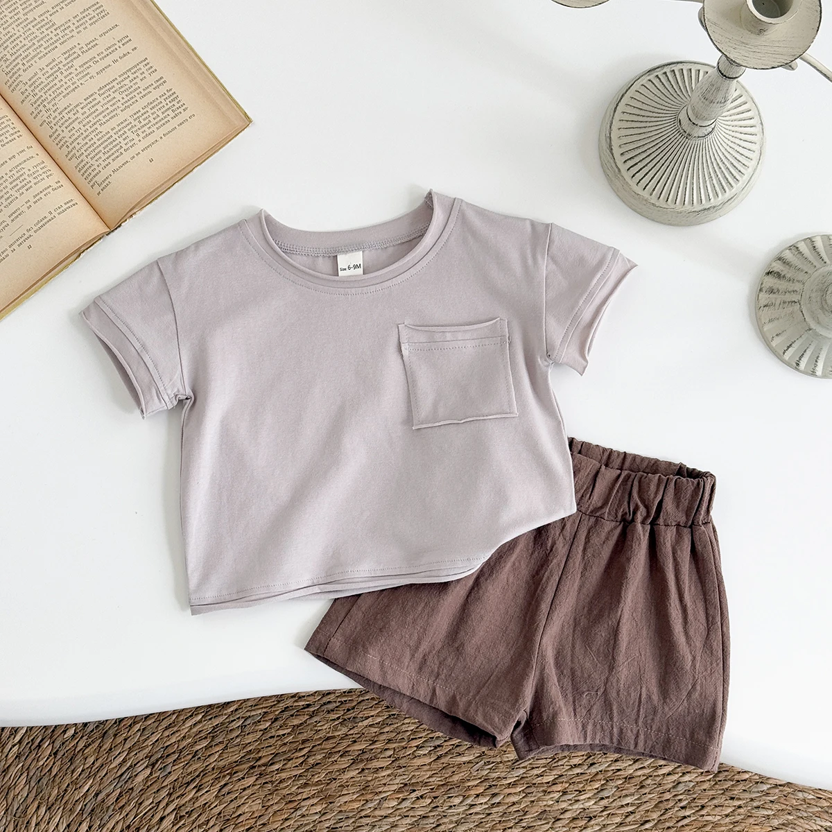 New Infant Child Set Solid Color Pocket Design Round Neck Short Sleeve+Loose Brown Beach Sports Shorts Summer Young Childrenv
New Infant Child Set Solid Color Pocket Design Round Neck Short Sleeve+Loose Brown Beach Sports Shorts Summer Young Childrenv