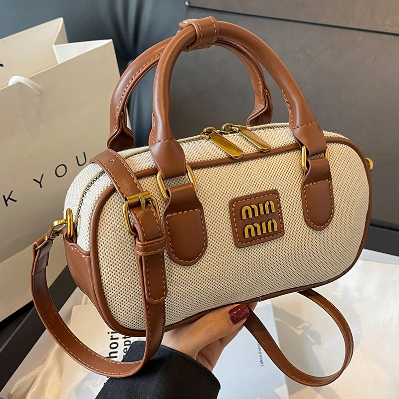 Luxury designer bowling bag women's bag 2025 new wild fashion contrast color portable small square bag shoulder messenger bag
Luxury designer bowling bag women's bag 2025 new wild fashion contrast color portable small square bag shoulder messenger bag