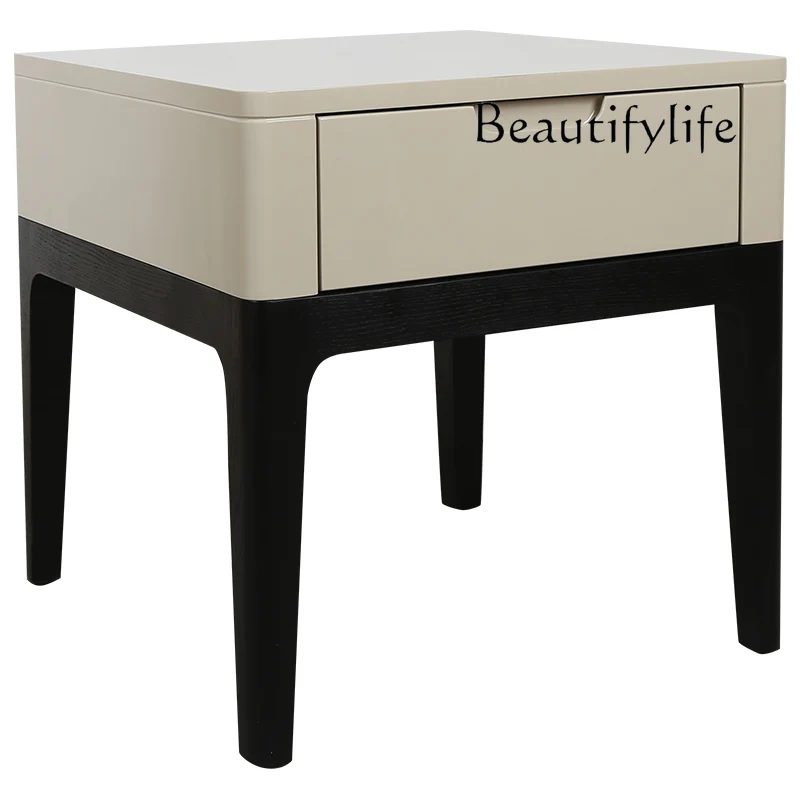 Italian Minimalist Modern Light Luxury Solid Wood Bedside Cabinet Bedroom Paint High Leg Bedside Storage Cabinet 
Italian Minimalist Modern Light Luxury Solid Wood Bedside Cabinet Bedroom Paint High Leg Bedside Storage Cabinet