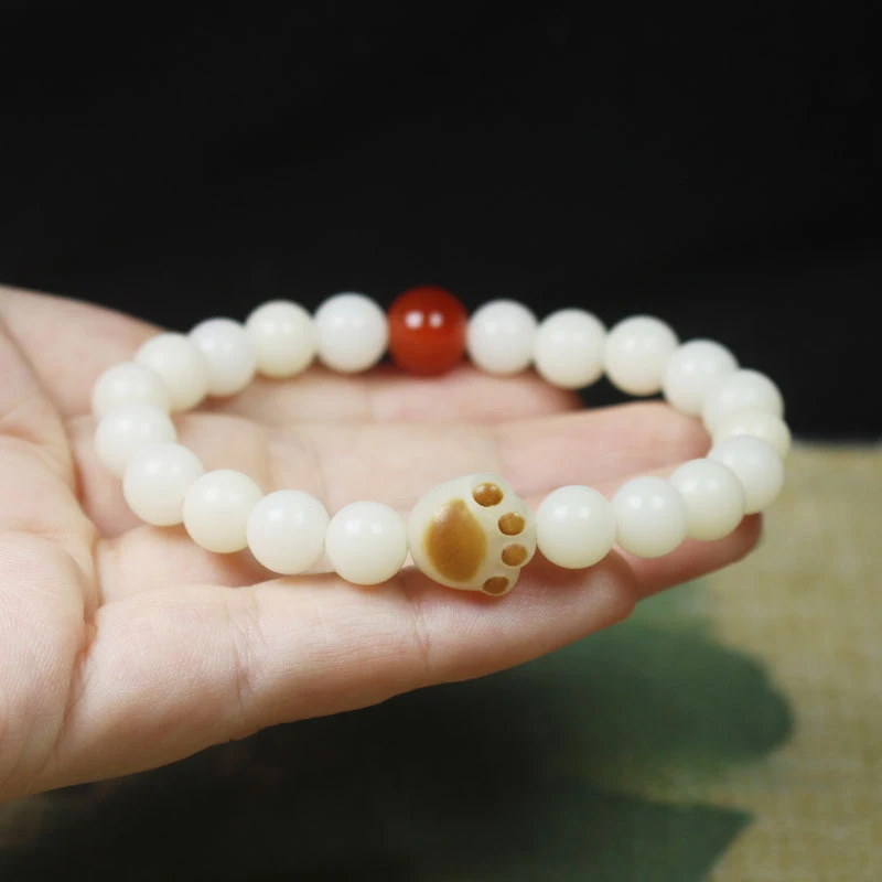 Charcoal-burned white jade bodhi root bracelet, cat paw prayer beads, unisex cultural and artistic accessory
Charcoal-burned white jade bodhi root bracelet, cat paw prayer beads, unisex cultural and artistic accessory