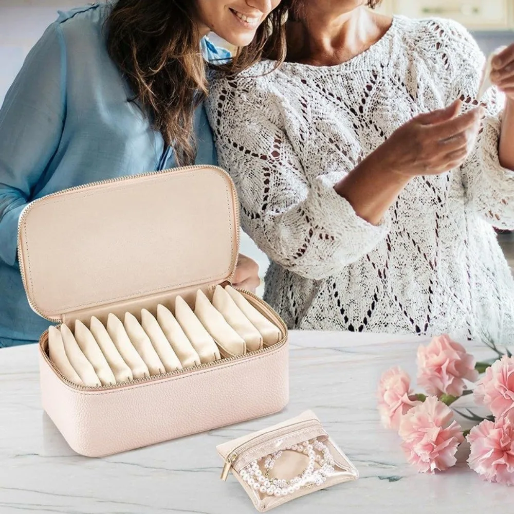 Модная пылезащитная шкатулка-органайзер для украшений из ПУ-кожи, демонстрационный футляр для ювелирных изделий из искусственной кожи с 12 маленькими мешочками, кейс для хранения украшений для дома
Модная пылезащитная шкатулка-органайзер для украшений из ПУ-кожи, демонстрационный футляр для ювелирных изделий из искусственной кожи с 12 маленькими мешочками, кейс для хранения украшений для дома