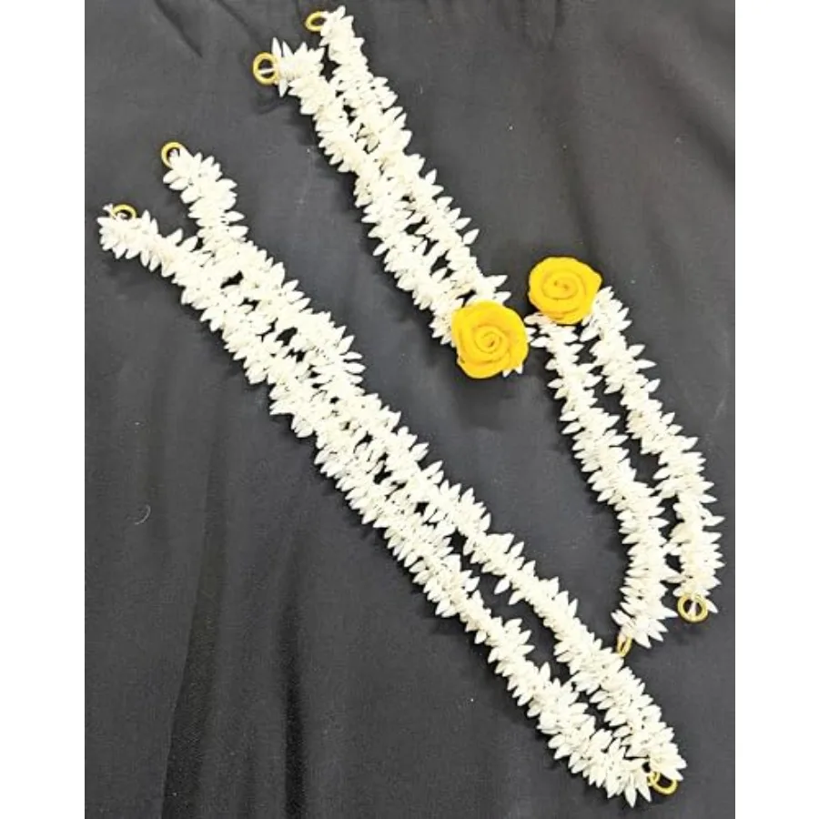 Artificial Hair Gajra,,2 and 2 with yellow flower
Artificial Hair Gajra,,2 and 2 with yellow flower
