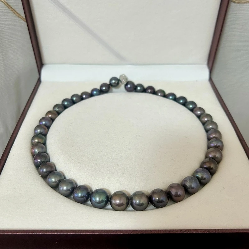 Натуральный черный жемчуг павлина 12–13 мм 999AA
Натуральный черный жемчуг павлина 12–13 мм 999AA