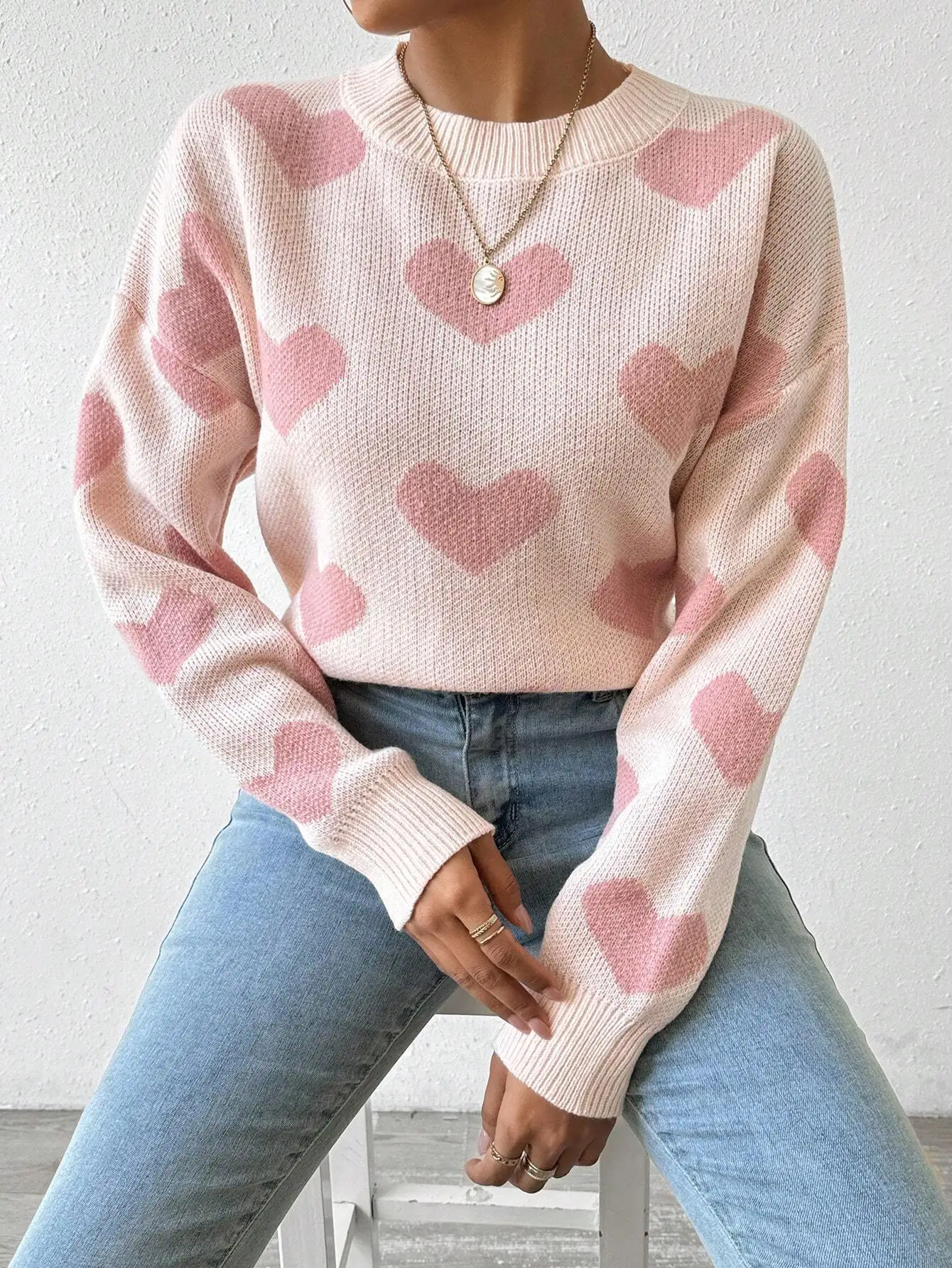 Pink Heart Print Drop Shoulder Knit Pullover Sweater for Women
Pink Heart Print Drop Shoulder Knit Pullover Sweater for Women
