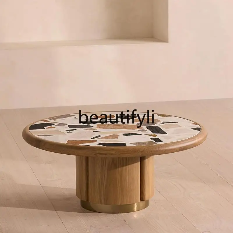 Nordic high-end solid wood coffee table simple terrazzo round tea table living room designer 
Nordic high-end solid wood coffee table simple terrazzo round tea table living room designer