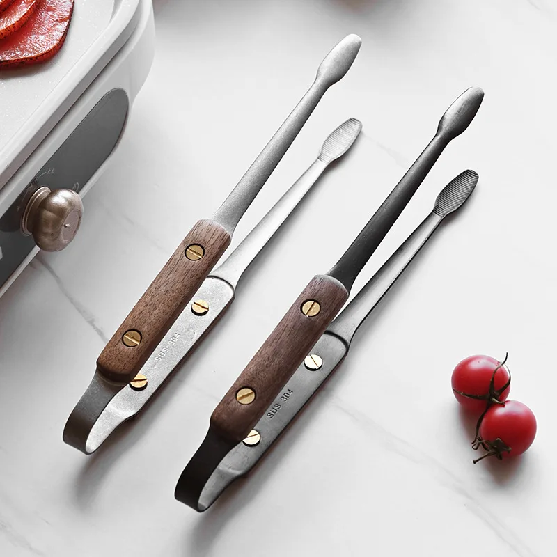 Japanese style walnut stainless steel food heat-resistant food clip, barbecue clip, outdoor barbecue clip
Japanese style walnut stainless steel food heat-resistant food clip, barbecue clip, outdoor barbecue clip