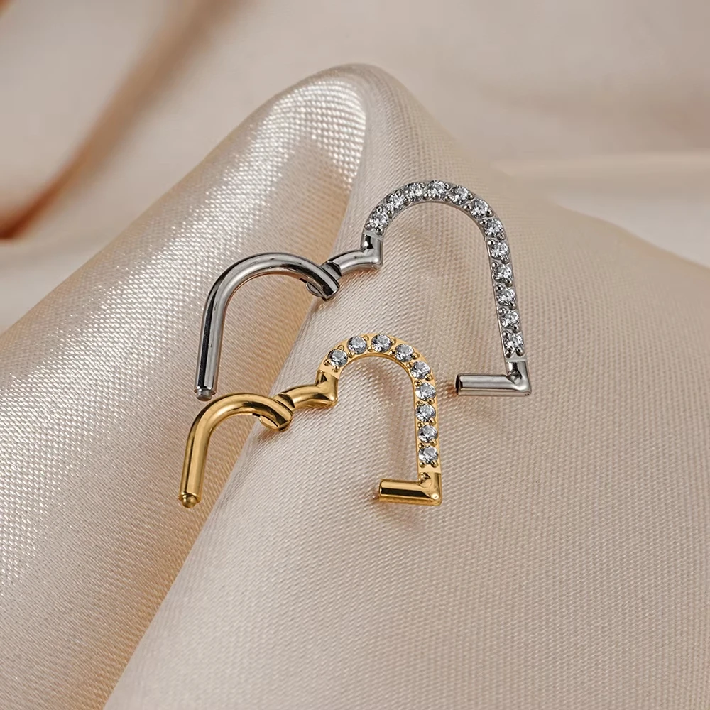 Wholesale ASTM F136 Titanium Daith Heart Earring Nose Ring Hoop Cartilage Tragus Helix Rings Hinged Segment Hoop with Clear CZ
Wholesale ASTM F136 Titanium Daith Heart Earring Nose Ring Hoop Cartilage Tragus Helix Rings Hinged Segment Hoop with Clear CZ