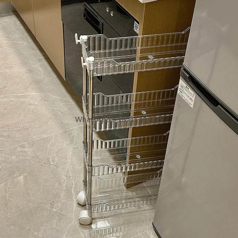 Handcart storage rack - a kitchen floor-standing mobile storage unit with multiple tiers for snacks. Bathroom storage wardrobe.
Handcart storage rack - a kitchen floor-standing mobile storage unit with multiple tiers for snacks. Bathroom storage wardrobe.