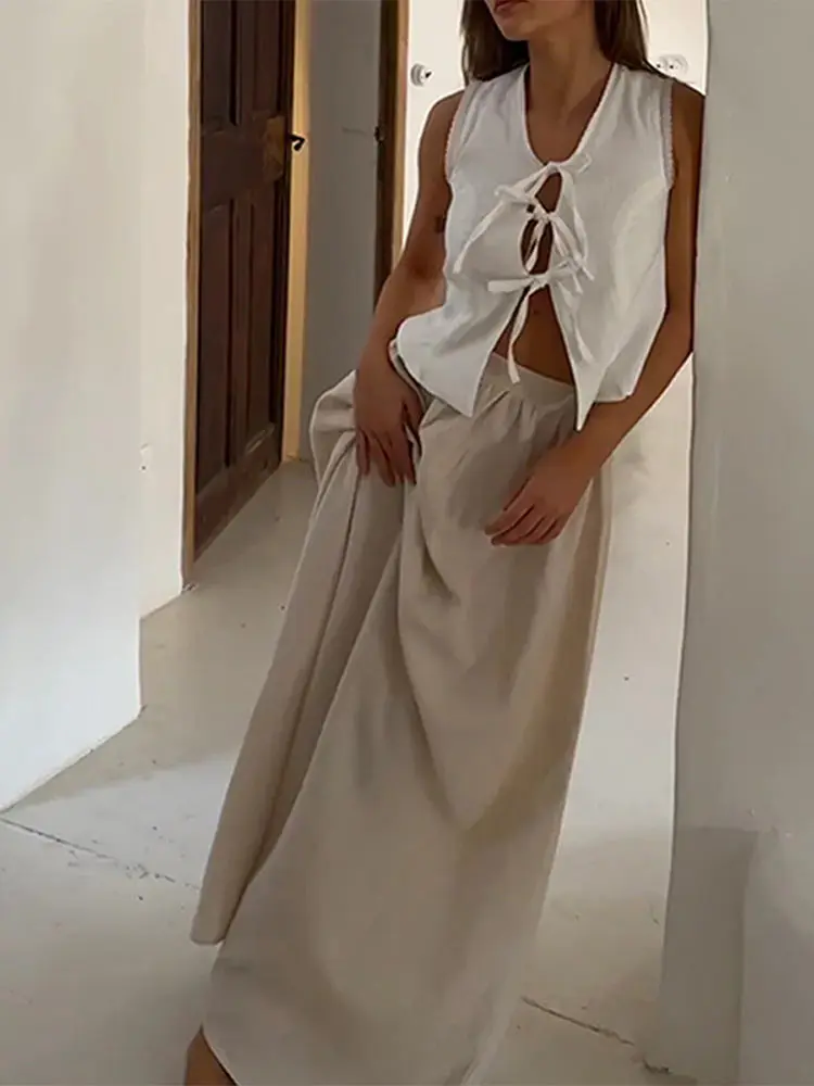 Chic Boho Maxi Skirts Suits Set Linen Women Sleeveless Tie-Front Top Loose Long Skirt 2-Piece Summer Casual Vacation Outfit
Chic Boho Maxi Skirts Suits Set Linen Women Sleeveless Tie-Front Top Loose Long Skirt 2-Piece Summer Casual Vacation Outfit
