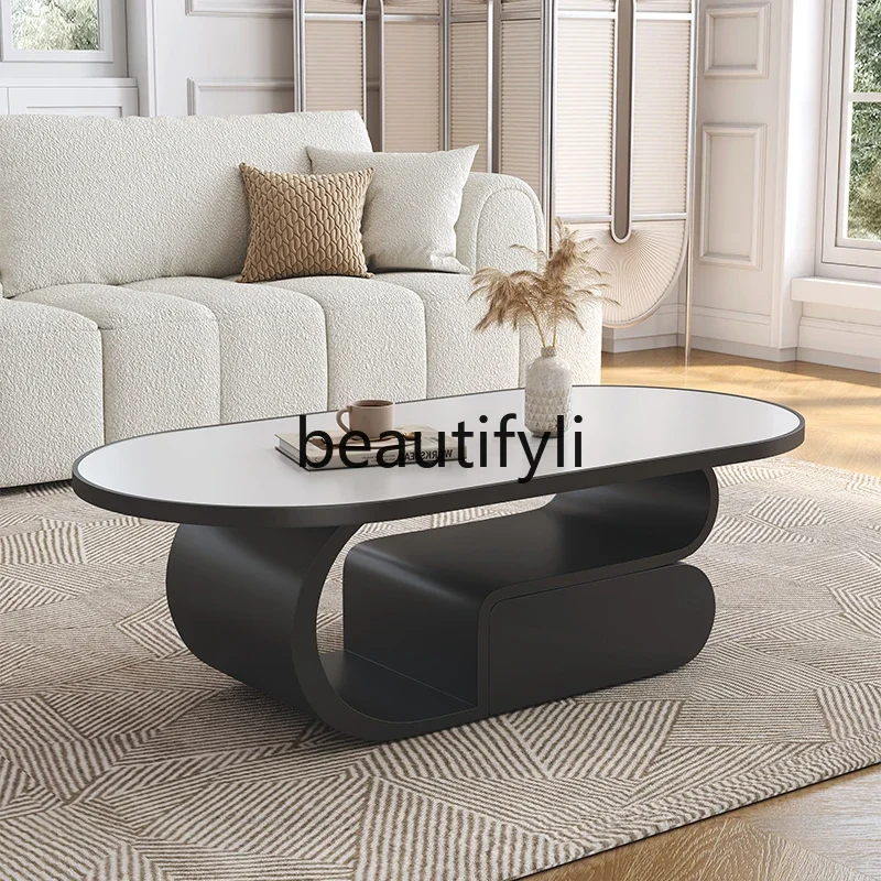 Simple cream wind rock slab coffee table small apartment feeling oval with storage small coffee table
Simple cream wind rock slab coffee table small apartment feeling oval with storage small coffee table