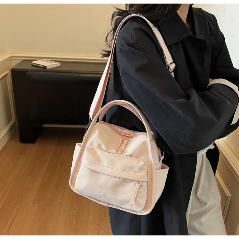 New Casual Shoulder Handbag, Premium Lightweight Bag, Nylon Cloth Women's Messenger Bag, Super Fire Small Bag.
New Casual Shoulder Handbag, Premium Lightweight Bag, Nylon Cloth Women's Messenger Bag, Super Fire Small Bag.