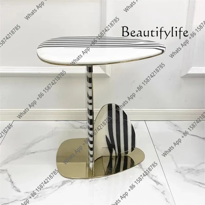 N19 Light luxury stainless steel creative modern living room small coffee table Italian designer personality artistic sense
N19 Light luxury stainless steel creative modern living room small coffee table Italian designer personality artistic sense